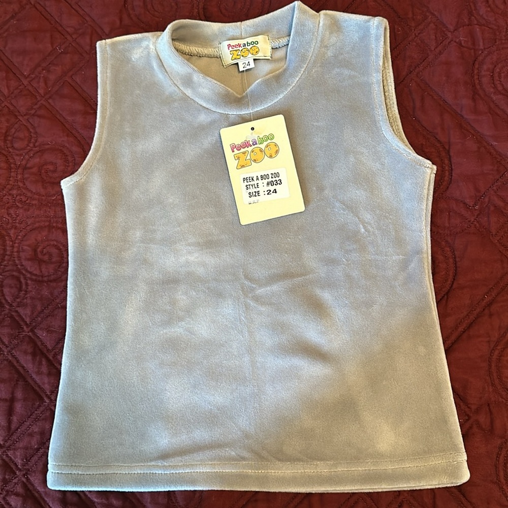 Very cute soft top for little princess, size 3-4Y. Smoke and pets free home.